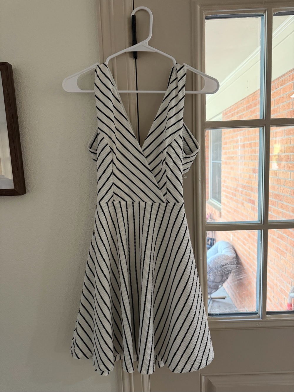 The Impeccable Pig White and Black Striped V-Neck Fit & Flare Mini Dress